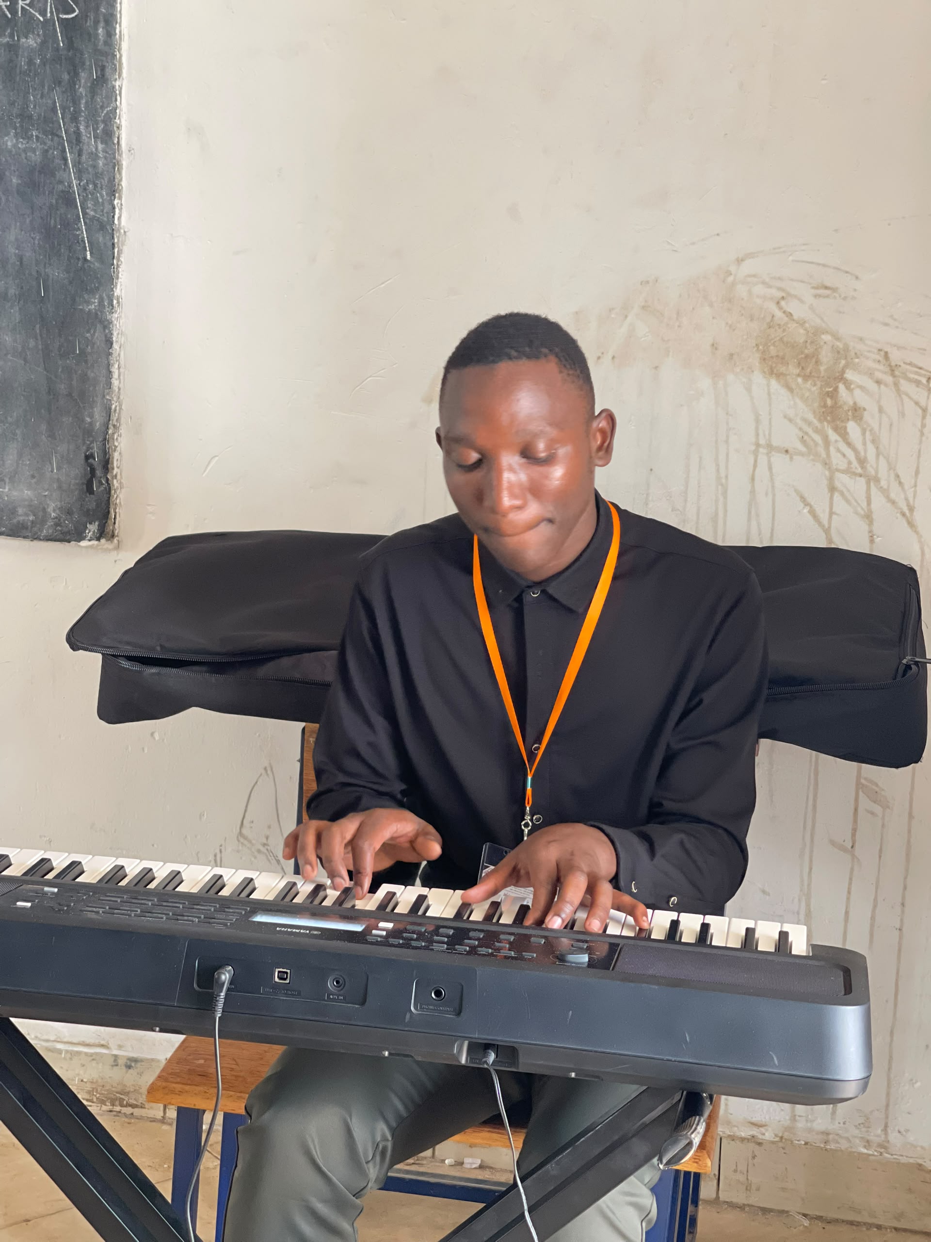 Fellowship musician playing keyboard during worship